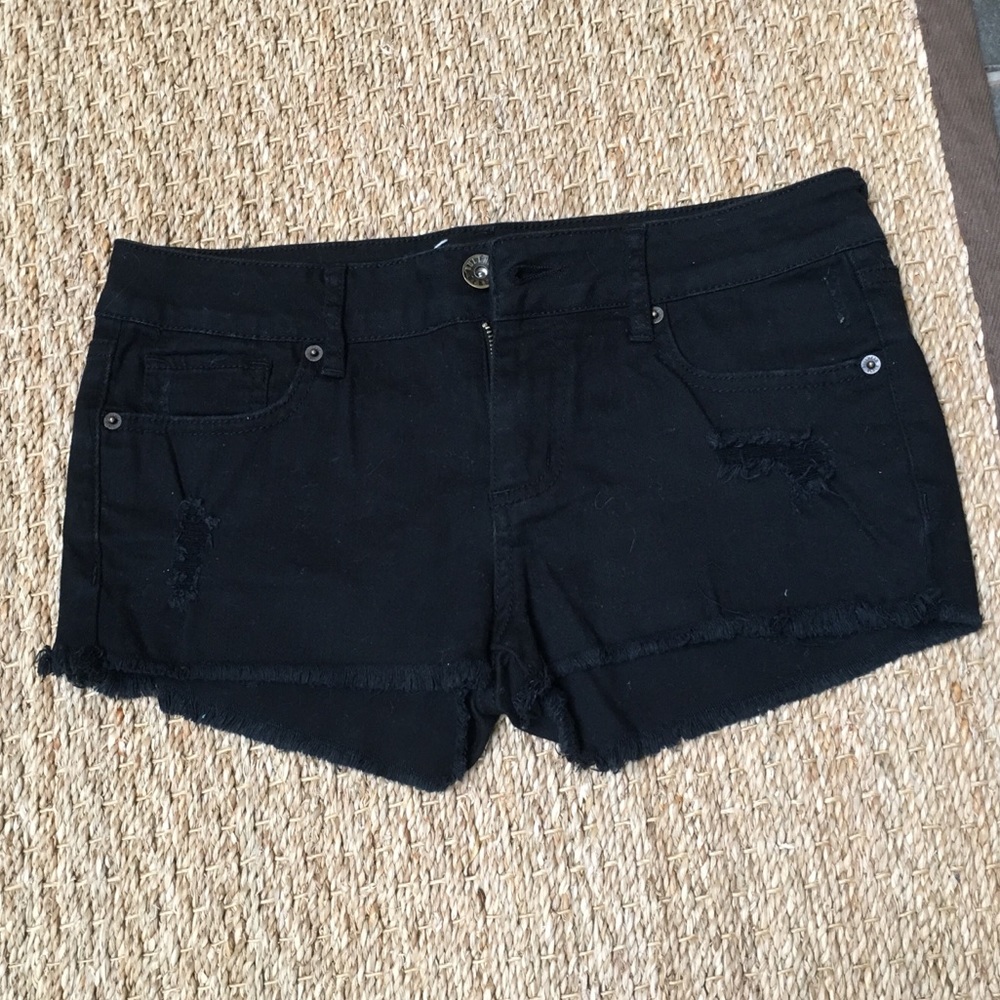 Black denim shorts.